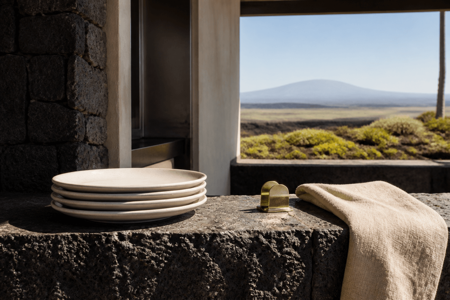 Four unused ivory plates stacked on a Kohala lava-stone pass in hard sun, brass clip.